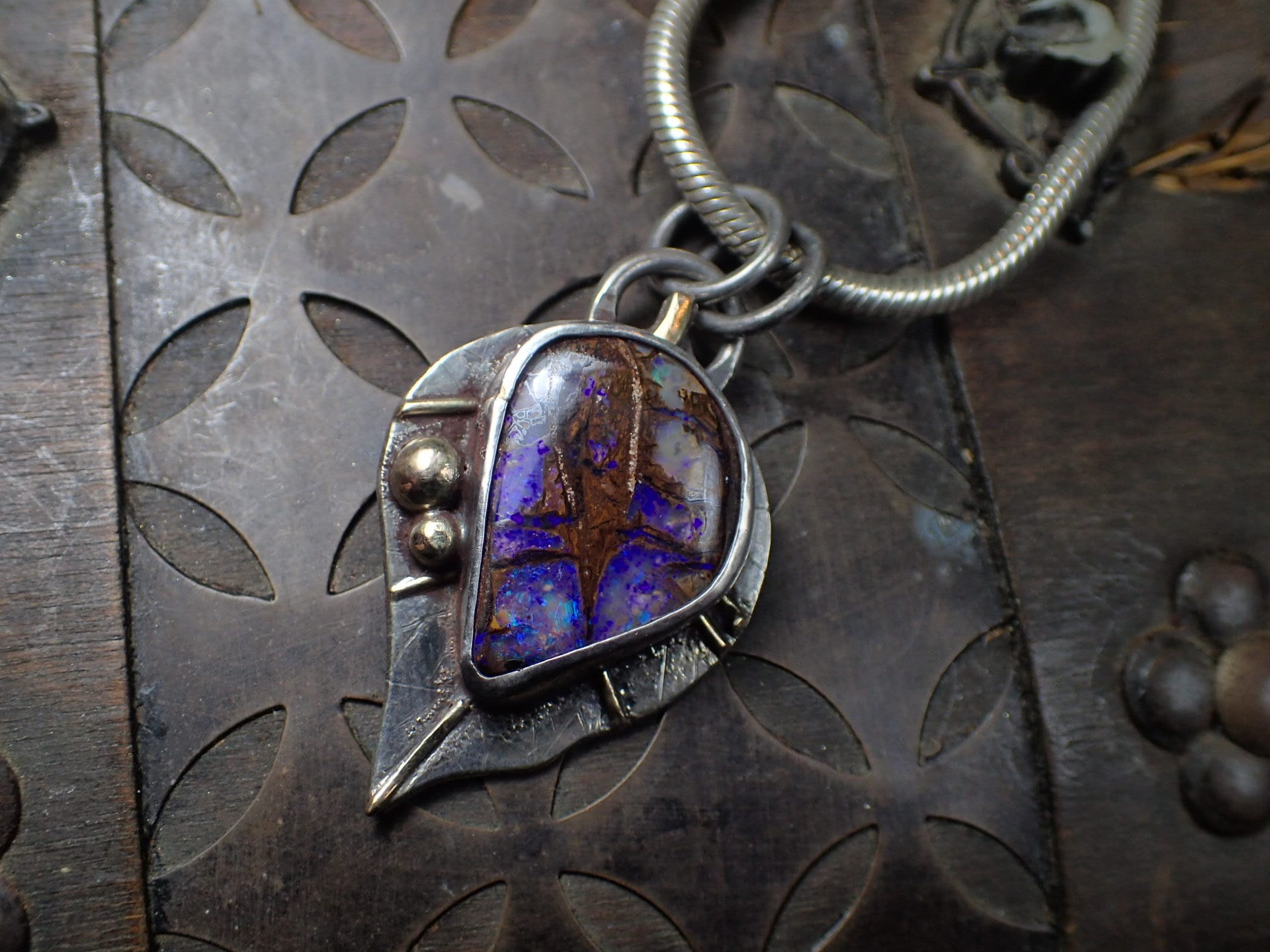 Wood Fossil Boulder Opal set in Leafy Motif Textured Silver and Gold Pendant