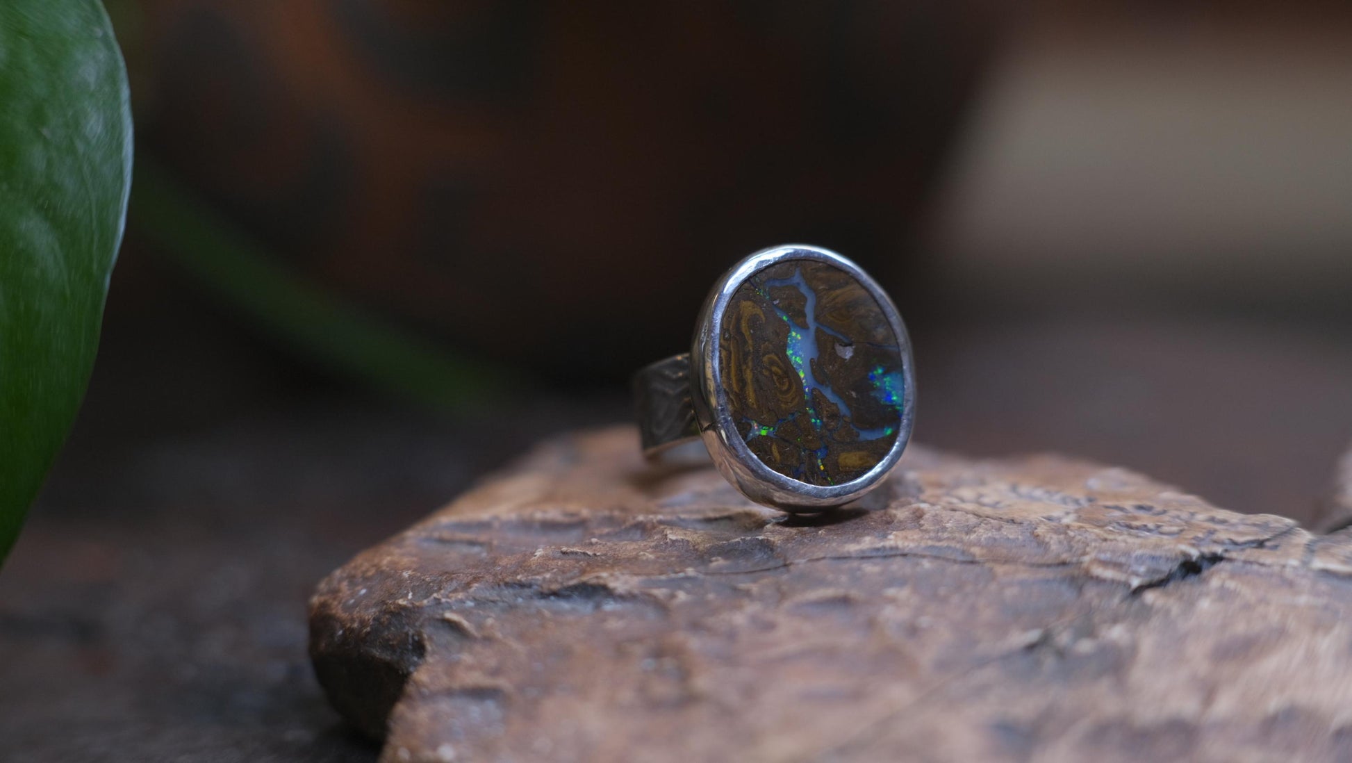 Striking Australian Boulder Opal Set on Rippled Sterling Silver Ring