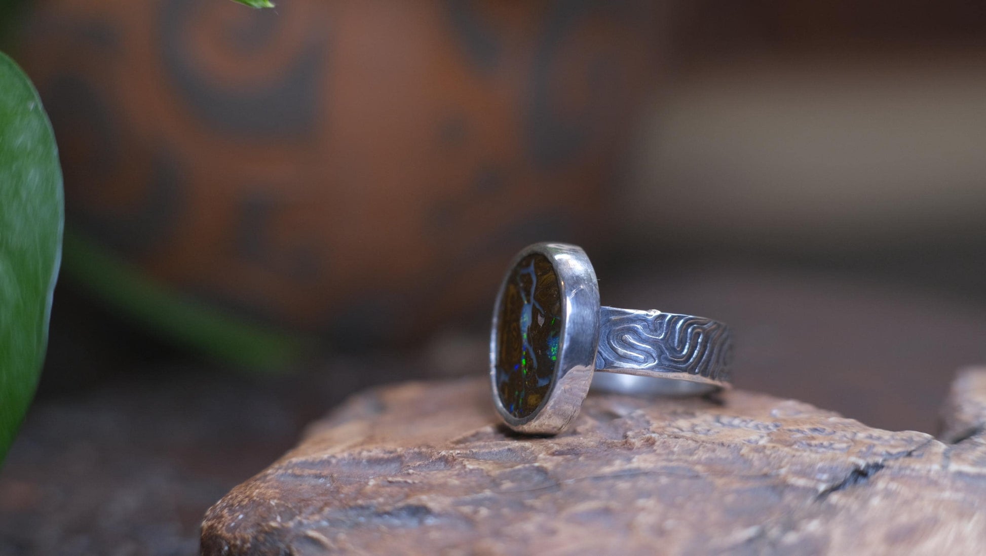 Striking Australian Boulder Opal Set on Rippled Sterling Silver Ring