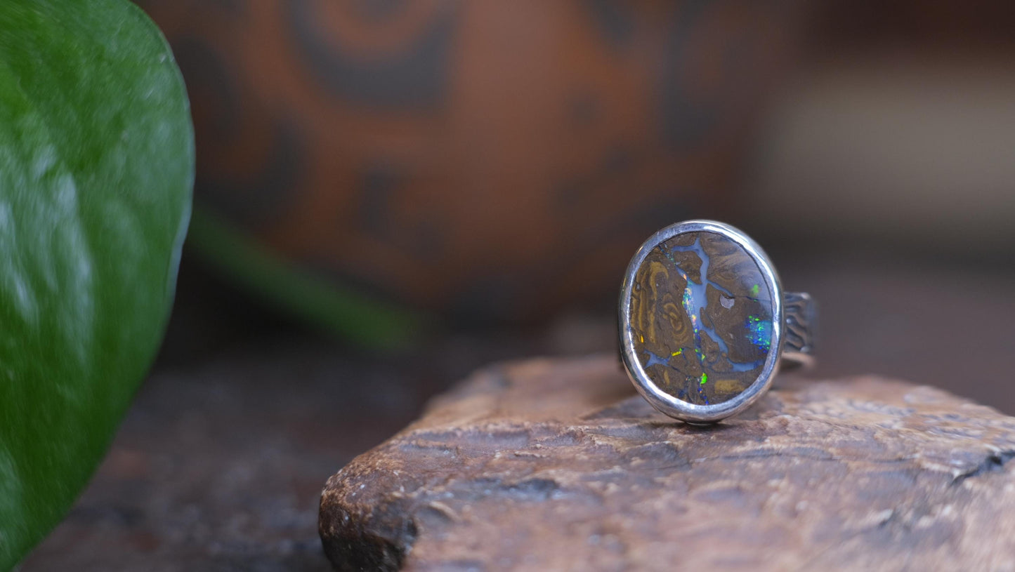 Striking Australian Boulder Opal Set on Rippled Sterling Silver Ring