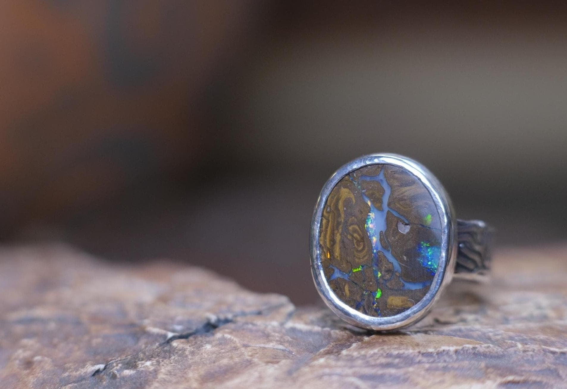 Striking Australian Boulder Opal Set on Rippled Sterling Silver Ring