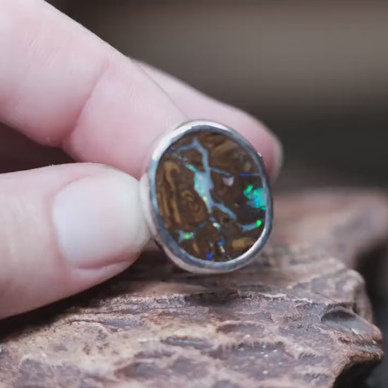 Striking Australian Boulder Opal Set on Rippled Sterling Silver Ring